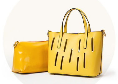 Unique hollow design Fashion Ladies Handbags solid anti wear nail on bottom